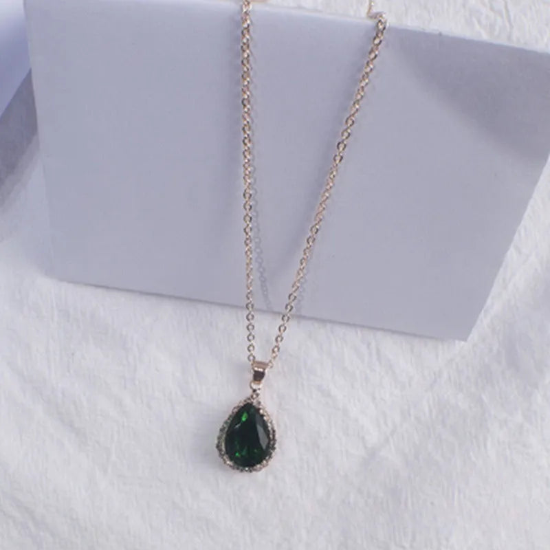 Pink rose gold drop shape rhinestone necklace with geometric design on alloy chain
