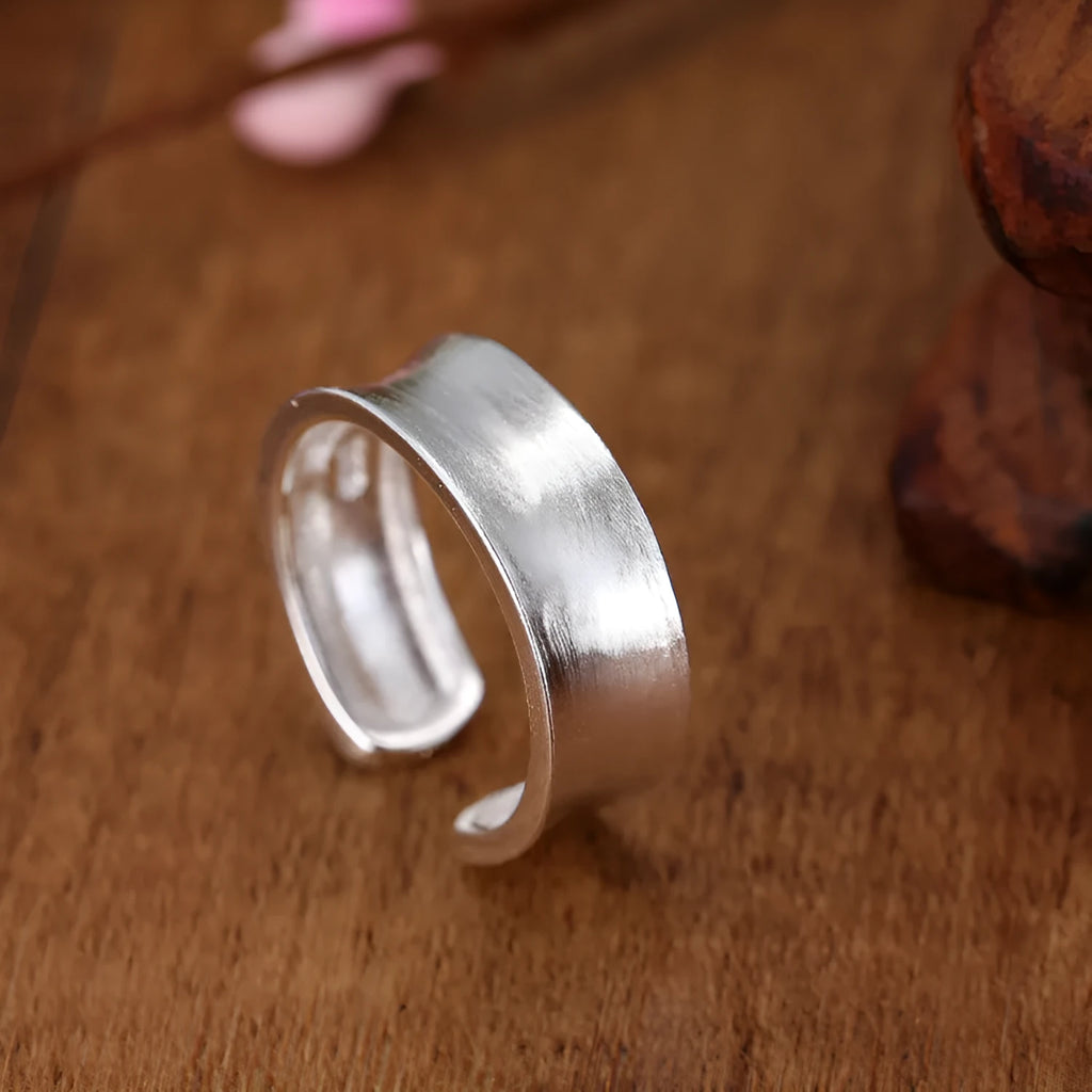 Adjustable opening geometric frosted sterling silver ring with open design