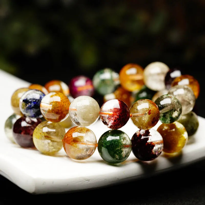 Natural colour crystal ghost cornucopia bracelet with 10mm beads and ethnic style design