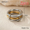 Stacked gold plated stainless steel rings with an exaggerated wide band design, shown in a free size.