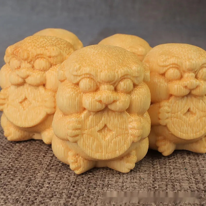 Set of two solid bamboo carving ornaments with engraved Chinese characters measuring 4.5cm tall