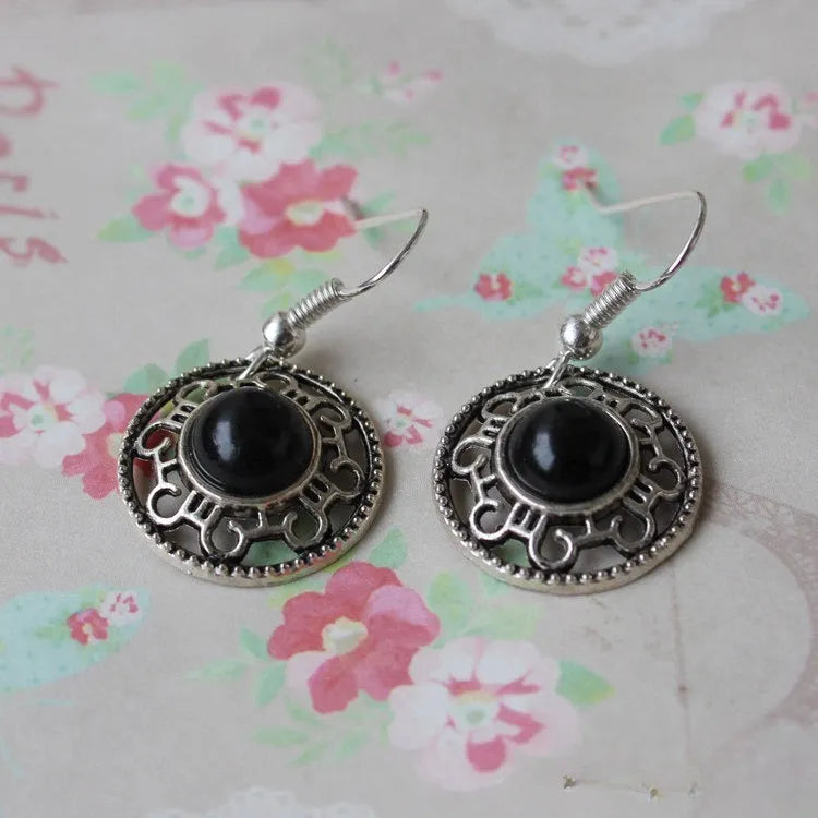 Miao silver ethnic earrings with turquoise geometric flower disk and auspicious patterns
