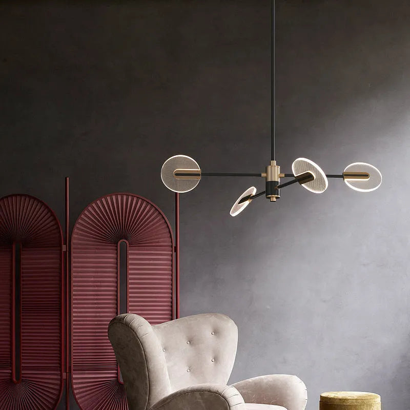 Nordic style black iron chandelier with multiple acrylic lamp shades hanging from ceiling