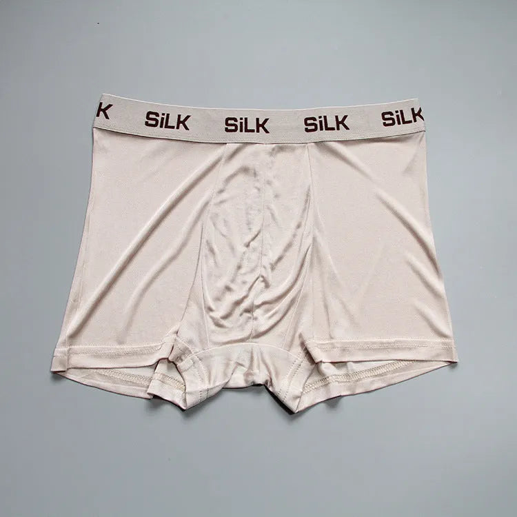 Men's loose fit silk shorts in navy blue, silver grey, or skin colour with mid-waist design
