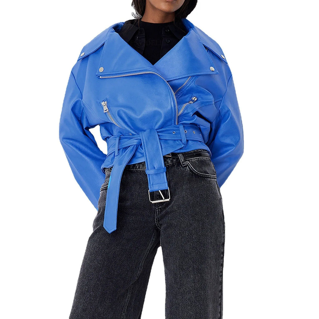Black punk style leather jacket with a Peter Pan collar and regular sleeves on a hanger.