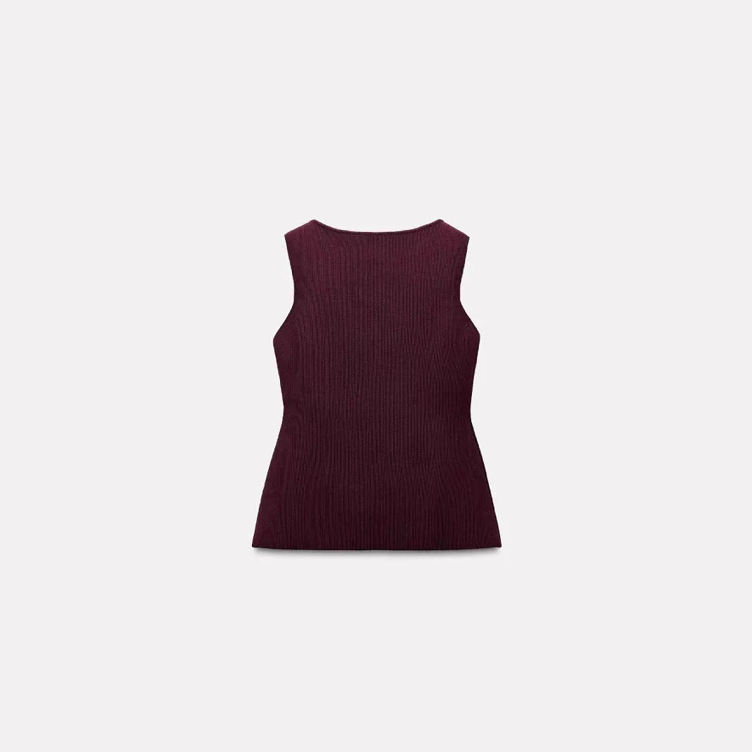 Dark red women's slim-fit viscose sweater vest with a 3D pattern, shown on a hanger.