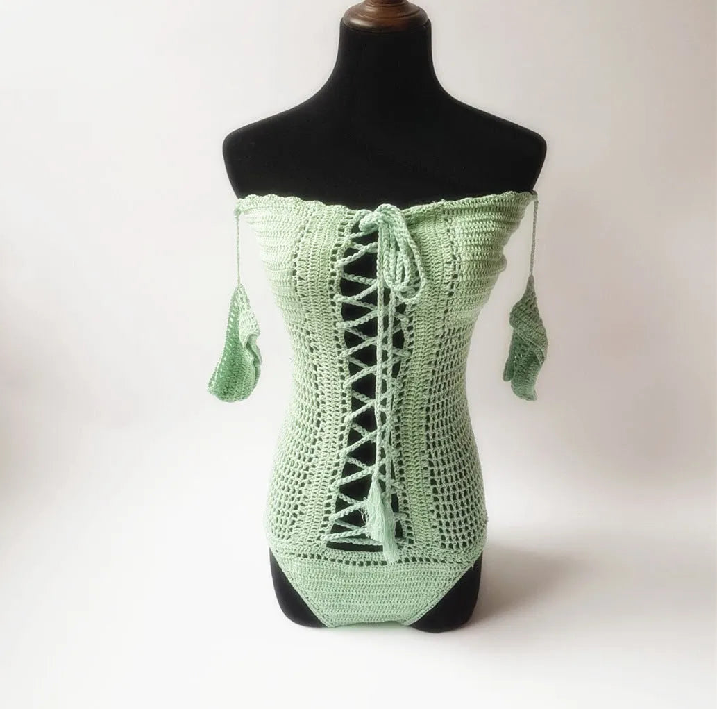 Off-shoulder one-piece swimsuit in white, black, grey, green, or pink.