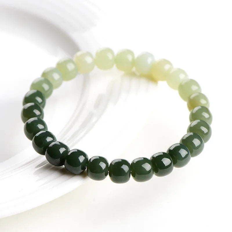 Natural Hetian jade bracelet with gradient clear water colour beads in polished finish