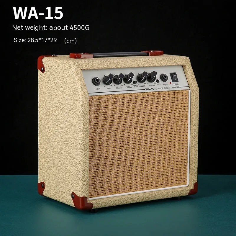 Small and easy to carry guitar audio amplifier with metal plastic construction, 25 by 8 by 26 cm