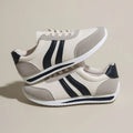 Red and blue lace-up leisure sneakers with soft rubber soles and mesh upper