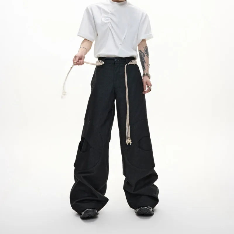 Men's dark blue straight-leg jeans with 3D cutting, belt stitching, and decorative pocket details