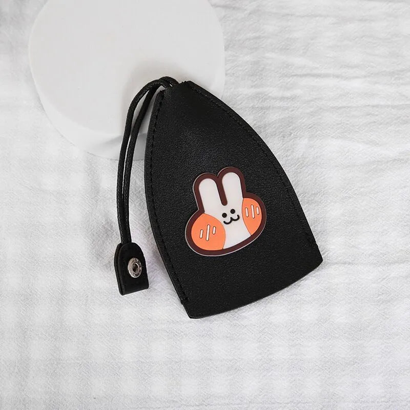 Cartoon pull-out key case in PU leather measuring 14 by 7.5 centimetres