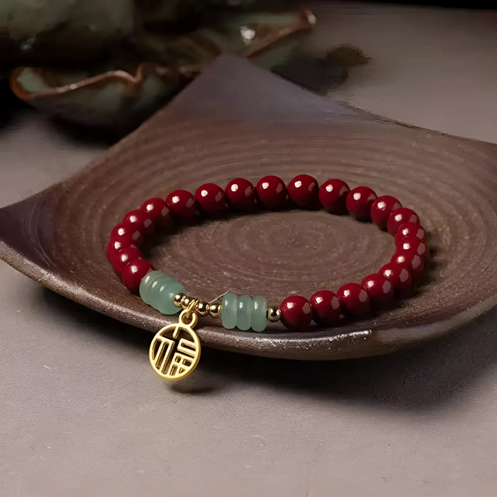 Close-up of a handcrafted wave-shaped cinnabar and copper bead bracelet in national style.