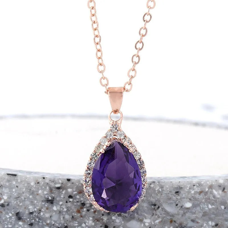 Pink rose gold drop shape rhinestone necklace with geometric design on alloy chain