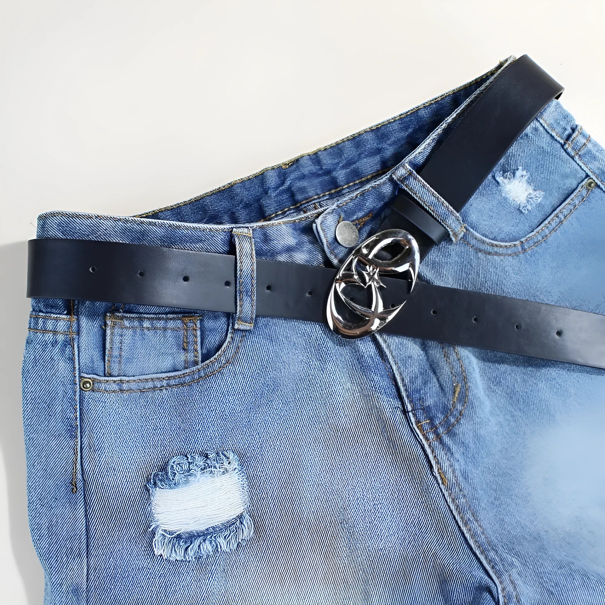 Casual silver alloy buckle on a brown PU leather belt with snap button fastening