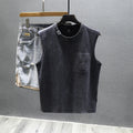 A man's solid black loose-fit cotton sleeveless T-shirt with a straight hem, laid flat.