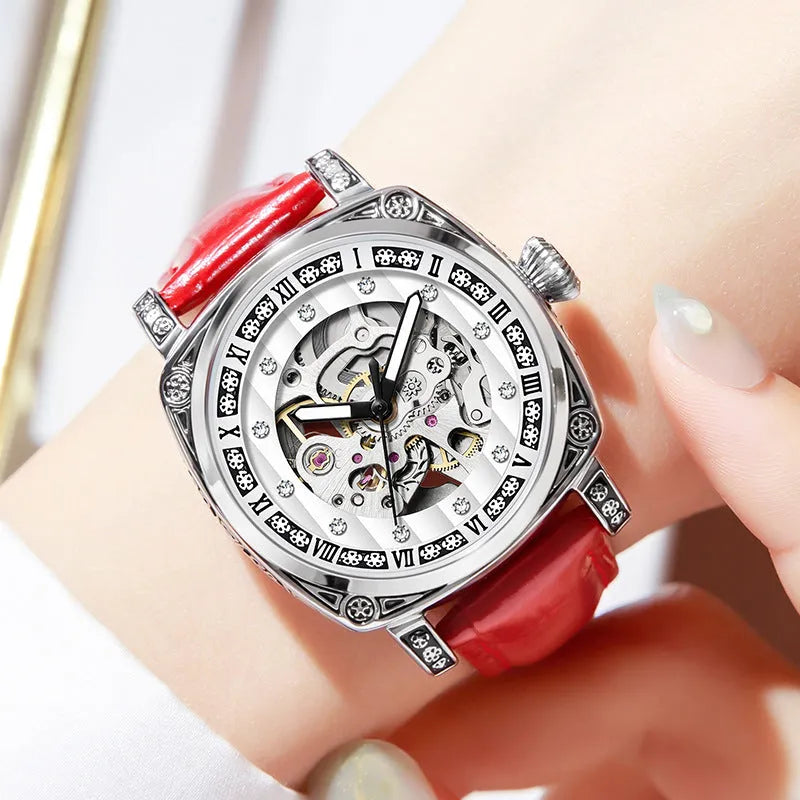 Men's mechanical watch with luminous hands on a leather strap, showing black, red, steel, and white colour options.