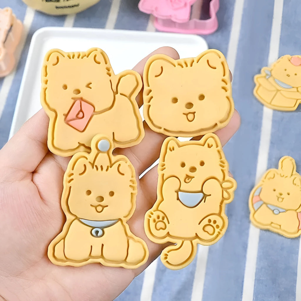 Three dimensional plastic puppy cartoon biscuit mould showing character designs