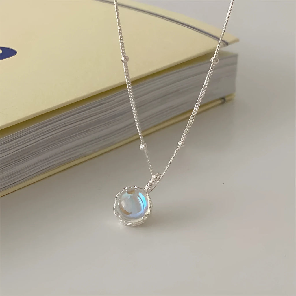 Geometric stone necklace in polished silver with adjustable curb chain