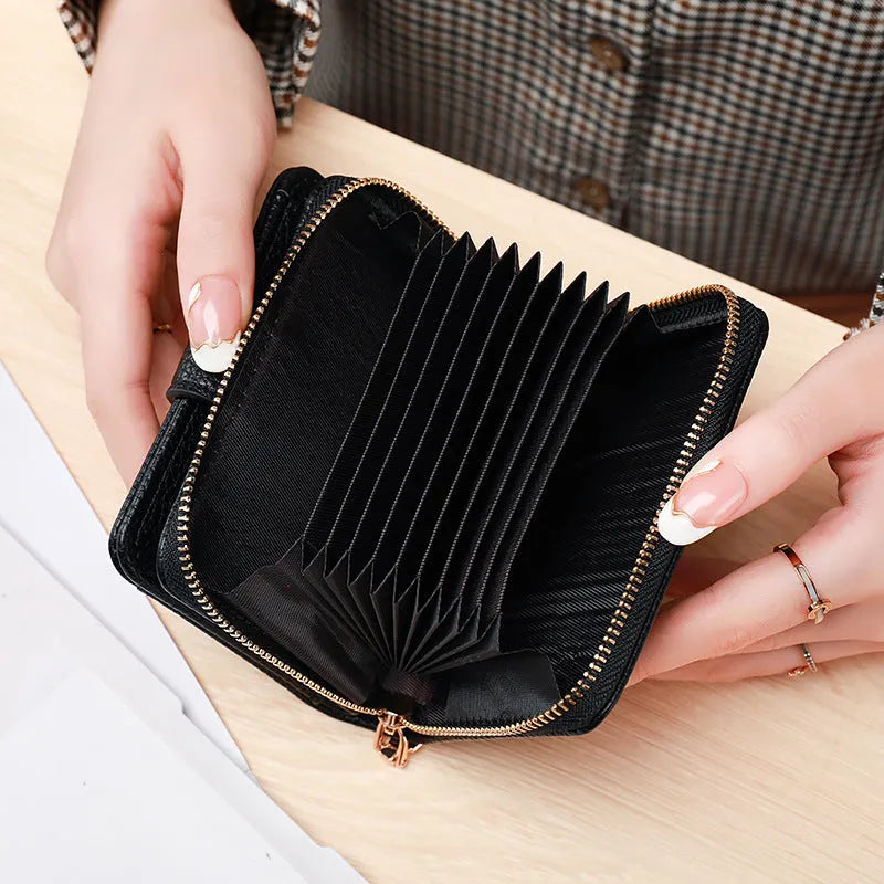 Ladies short wallet with lychee pattern in beige, pink, black and red colour options showing two-fold design