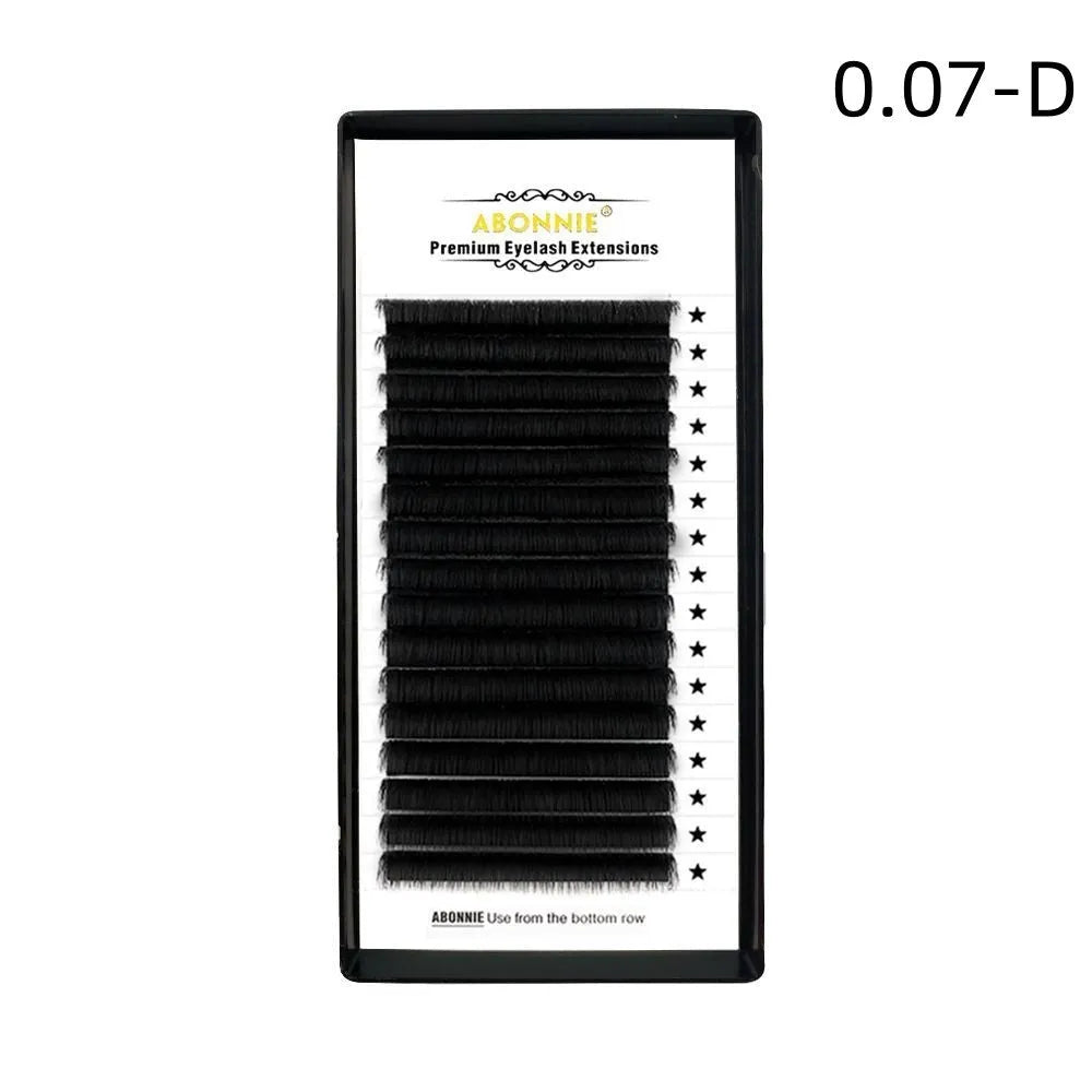 Dense 16-row false eyelashes made from mink hair in a matte round wool style on a clear strip.