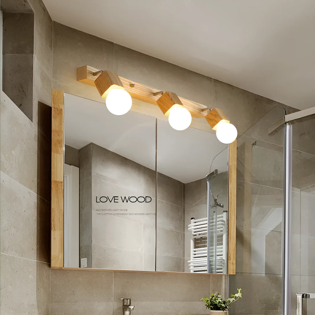 Single-headed 24cm wide LED mirror cabinet wall lamp mounted on a wall