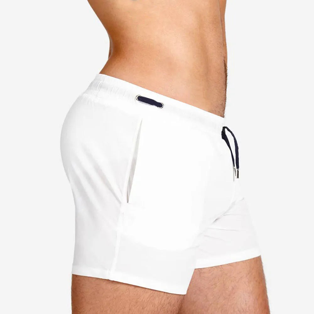 Men's solid colour polyester swimming shorts with mesh lining in army green