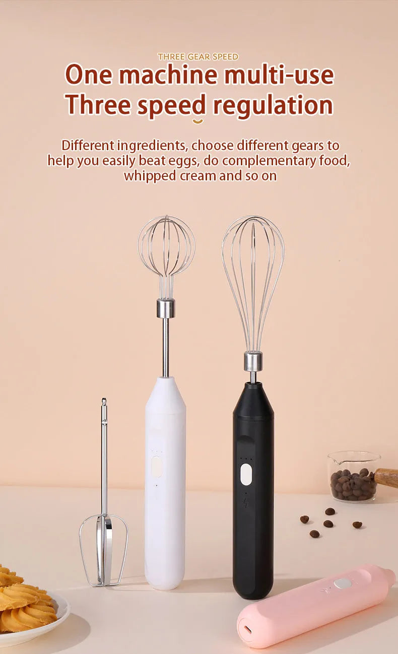 Hand-held wireless electric whisk in black and pink, with straight handle and stainless steel whisk attachment