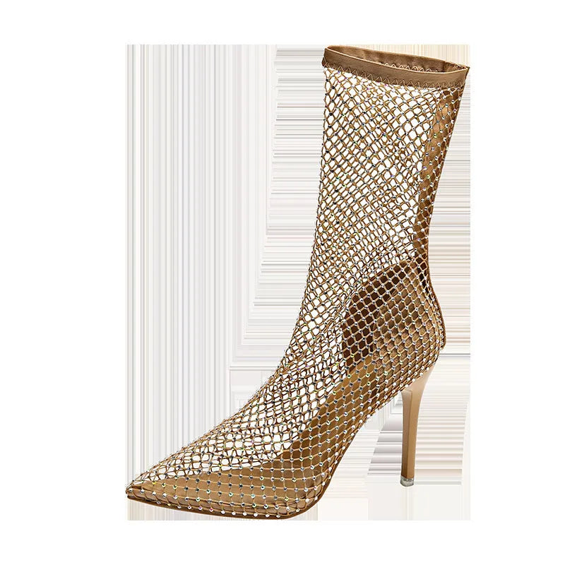 Gold high heel sandals with pointed toe, stiletto heel, mesh upper, and ankle strap.
