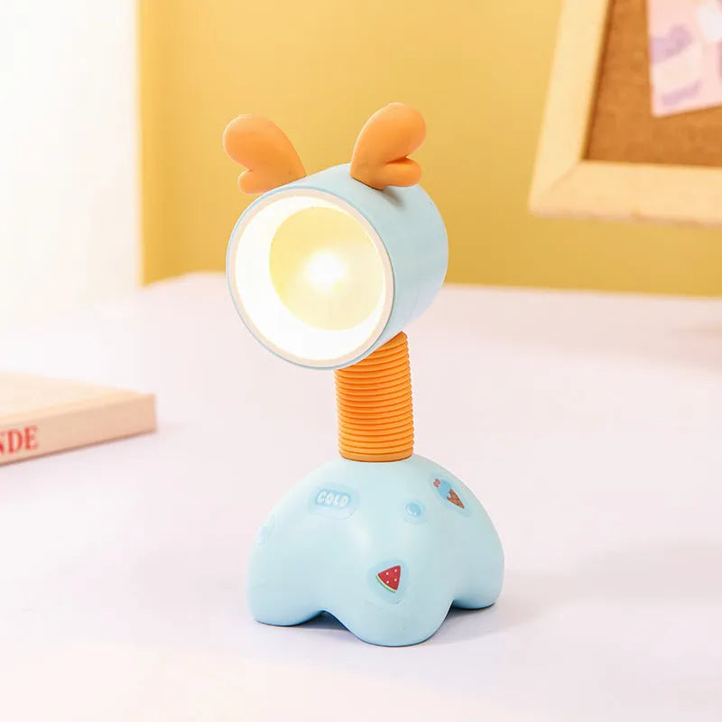 DIY magnetic cartoon small night lamp with multi-angle adjustable lighting on desktop