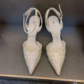 Women's black and silver hollow high heels with red sole and stiletto heel design
