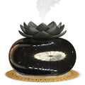 Black lotus-shaped ultrasonic humidifier with USB cable connection