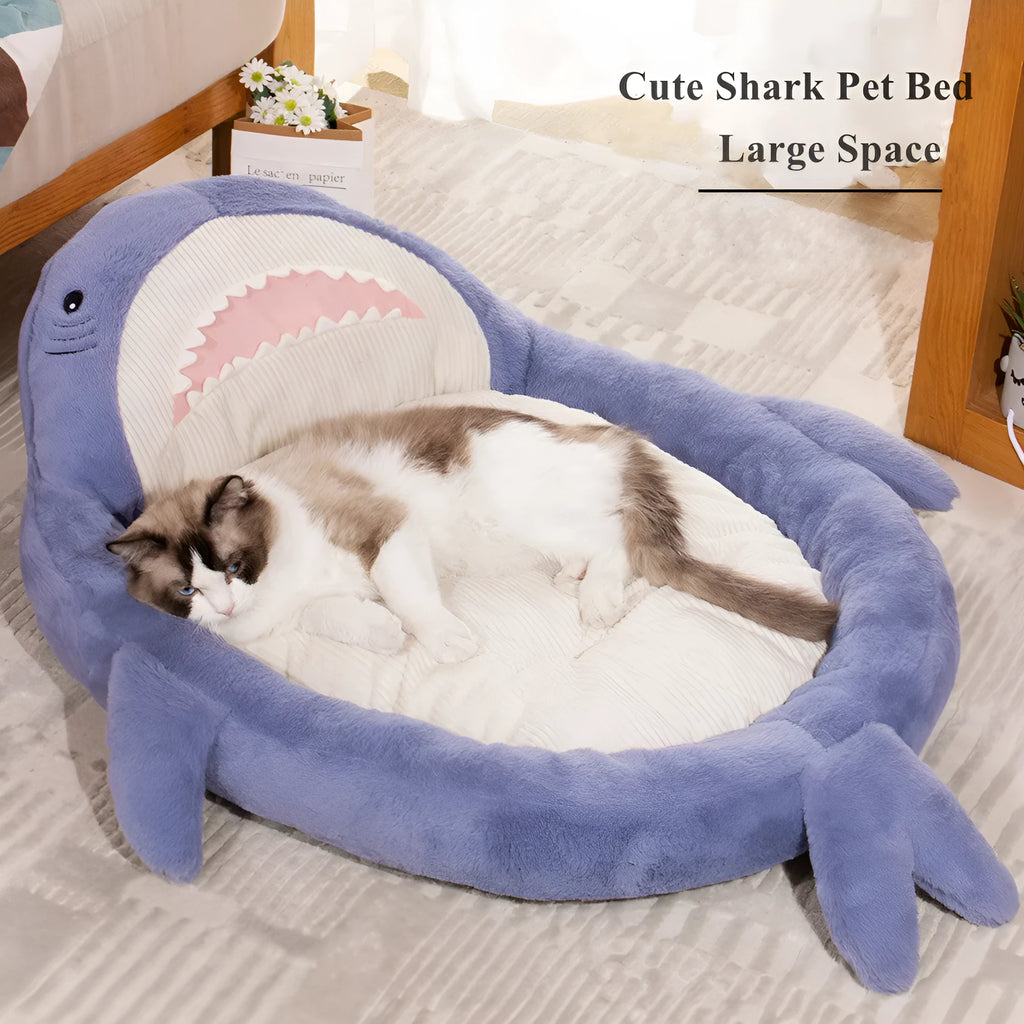 Blue shark pattern pet bed with anti-slip base showing velvet fabric texture
