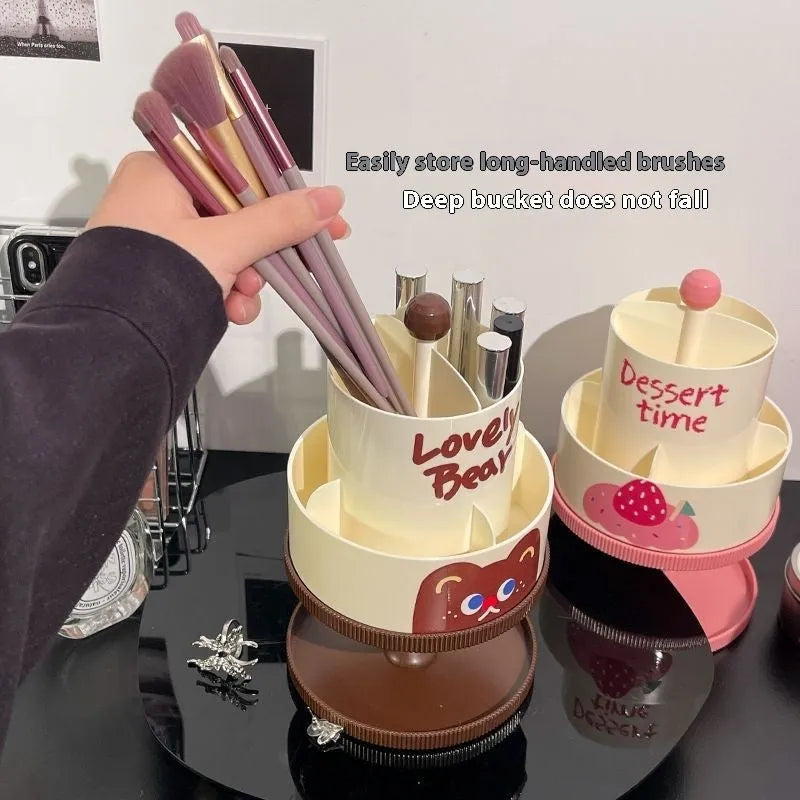 Beige rotating cosmetic brush storage barrel with 18-litre capacity on a table.