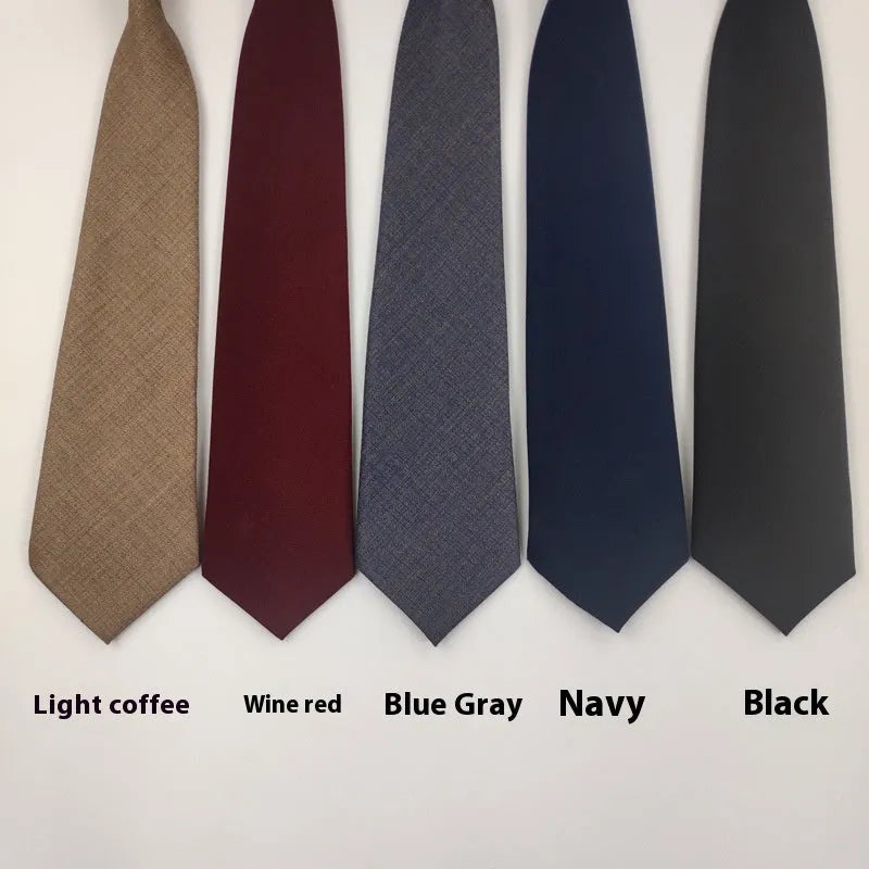 Men's solid colour cotton arrow style bow tie in navy blue.