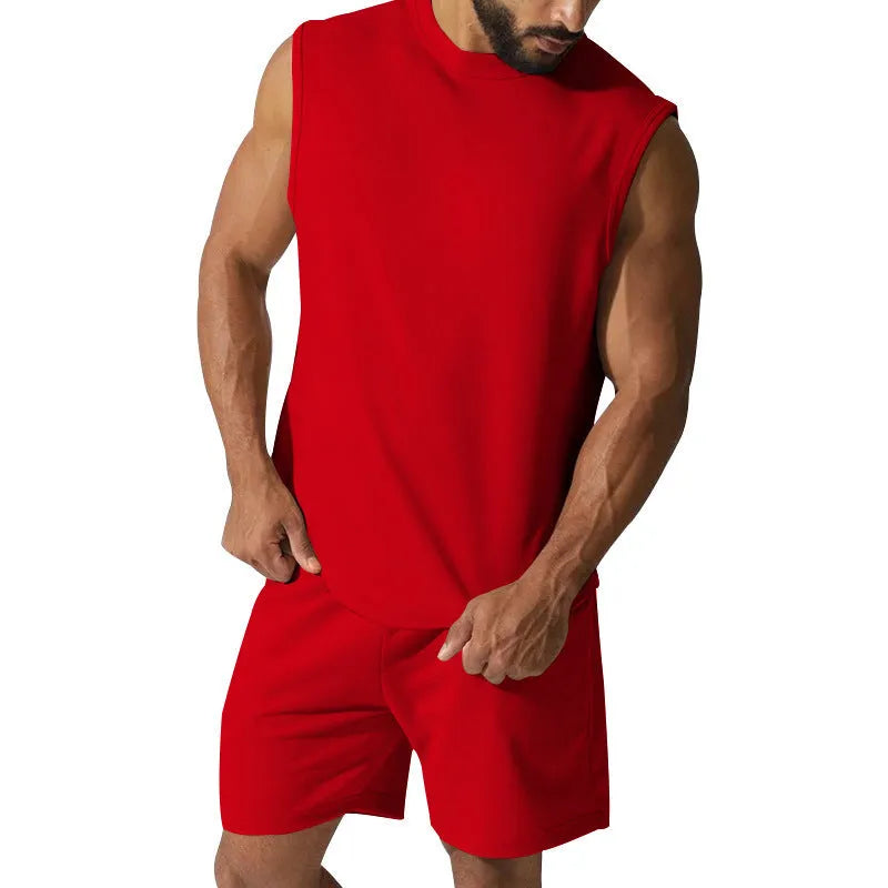 Men's sleeveless cotton blend sports top and matching shorts in a solid colour, laid flat.