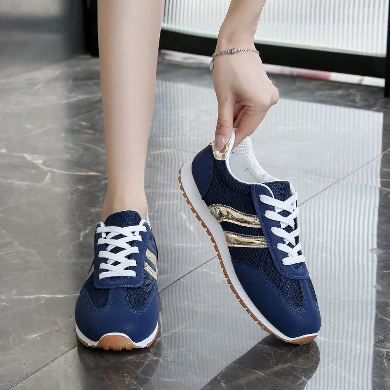 Blue women's casual shoes with cross shoulder straps and rubber soles