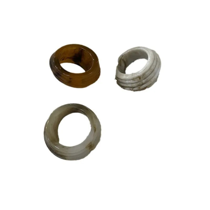 Resin ring with irregular wide band geometric design in Chinese retro style