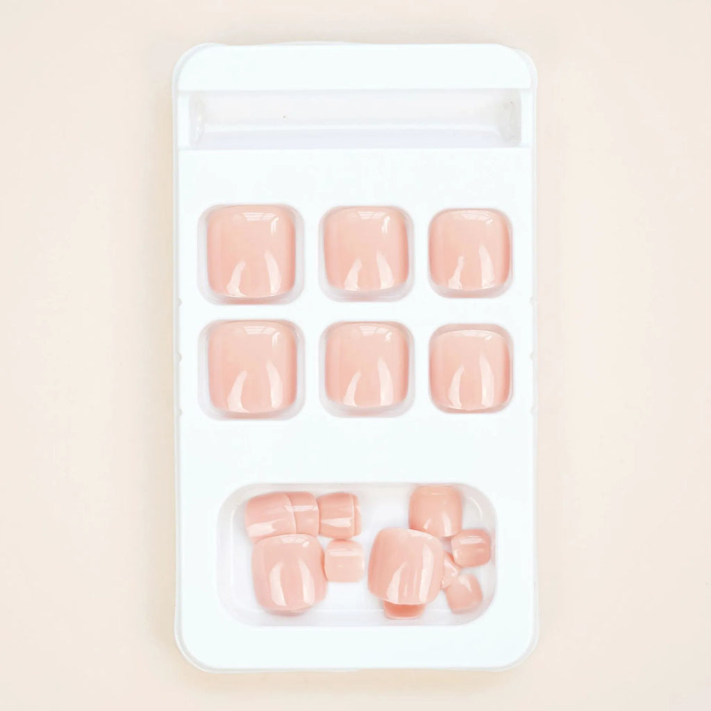 Artificial toenail stickers in J-52 skin colour with adhesive glue complete set
