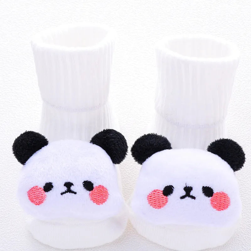 Cotton baby floor socks with non-slip soles in a pink bow print design.