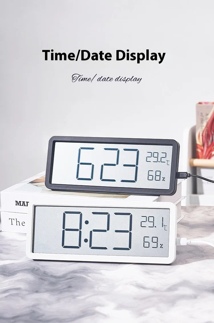 Simple large screen temperature and humidity clock in plastic with Nordic style, black colour, on a desk.