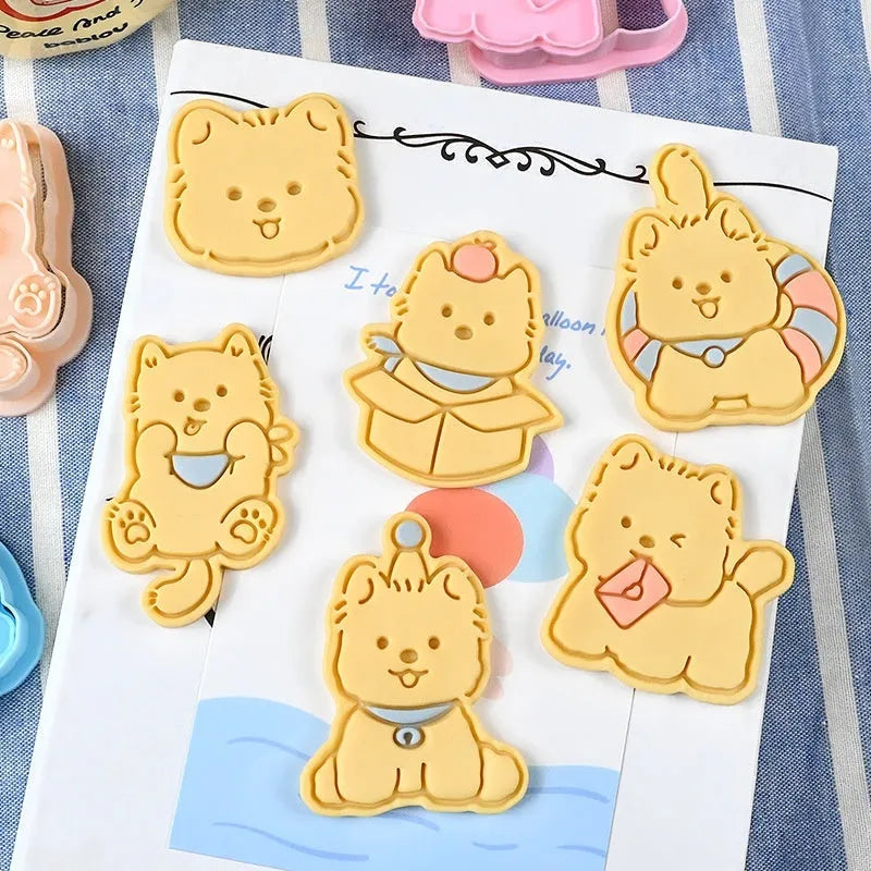 Three dimensional plastic puppy cartoon biscuit mould showing character designs