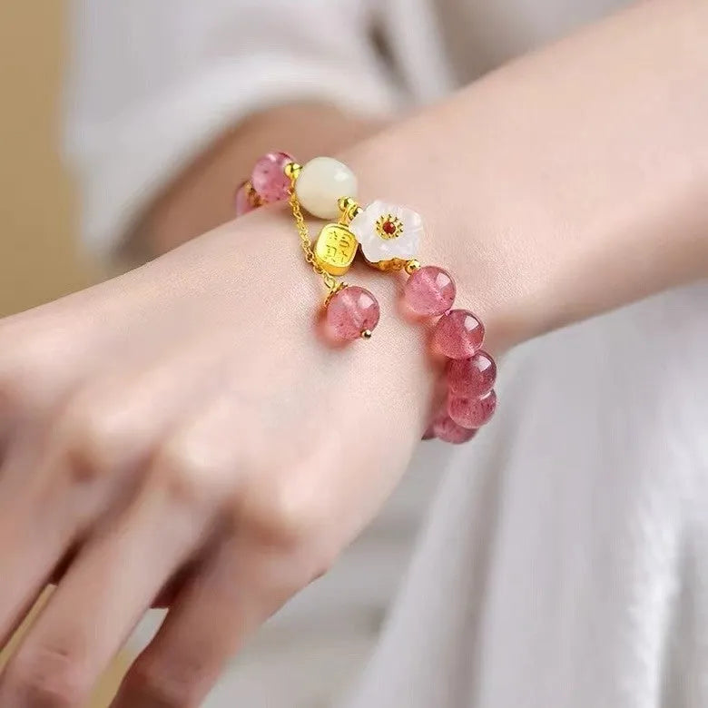 Handmade strawberry quartz crystal bracelet with green quartz moon charm for women