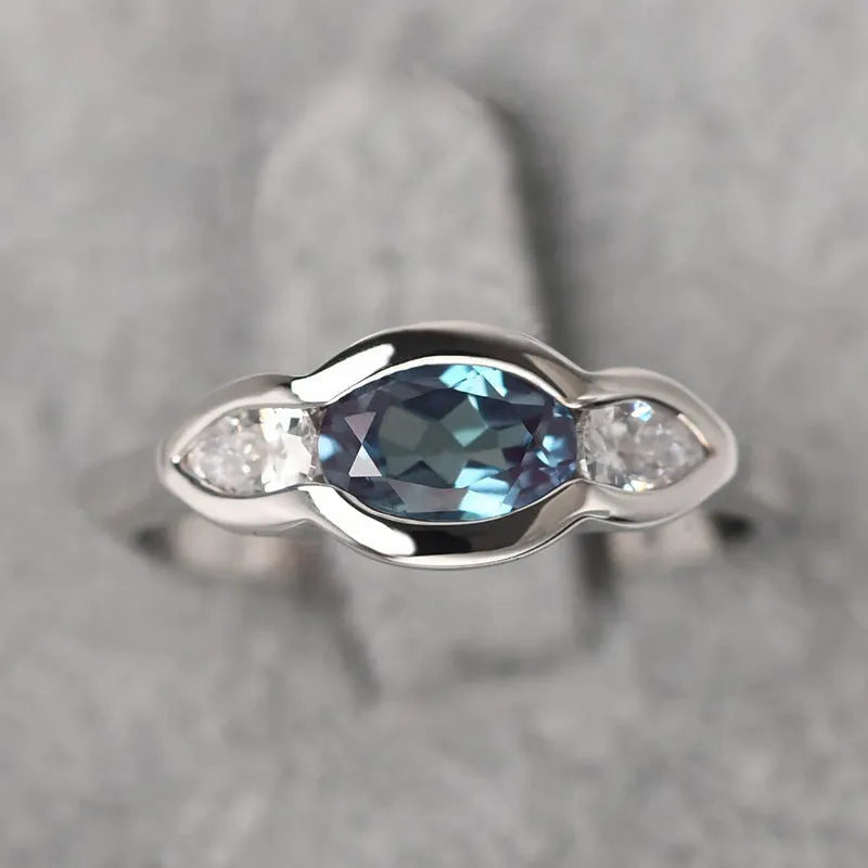 Geometric ellipse zircon ring in white gold colour showing contemporary design