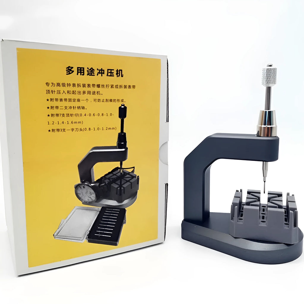 Silver multi-purpose press strap removal tool with a pointed blade for watch and jewellery repair.