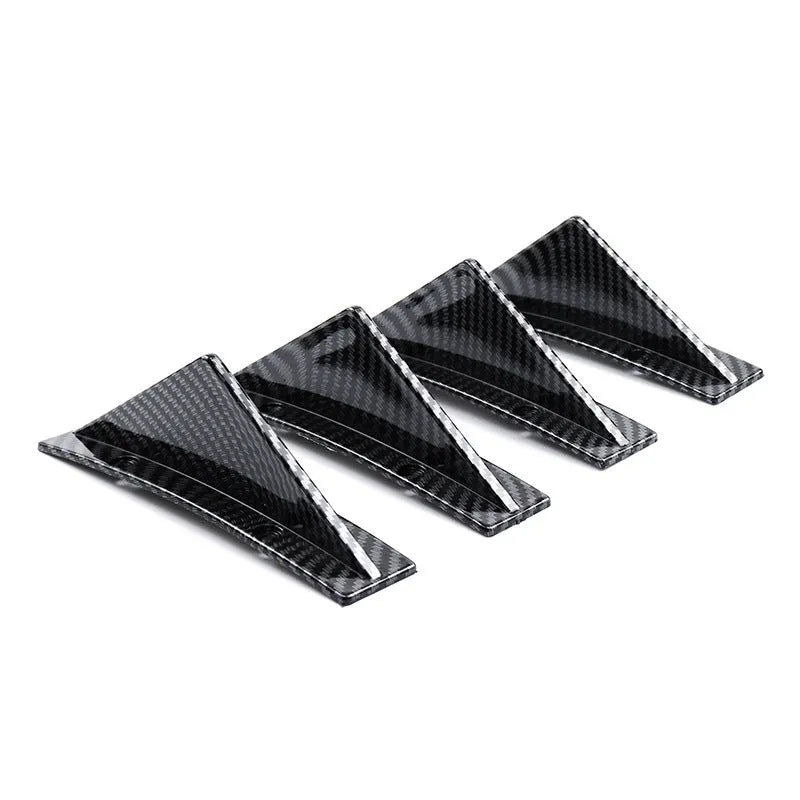 Four triangular automotive rear spoiler units for General Motors vehicles with mounting hardware