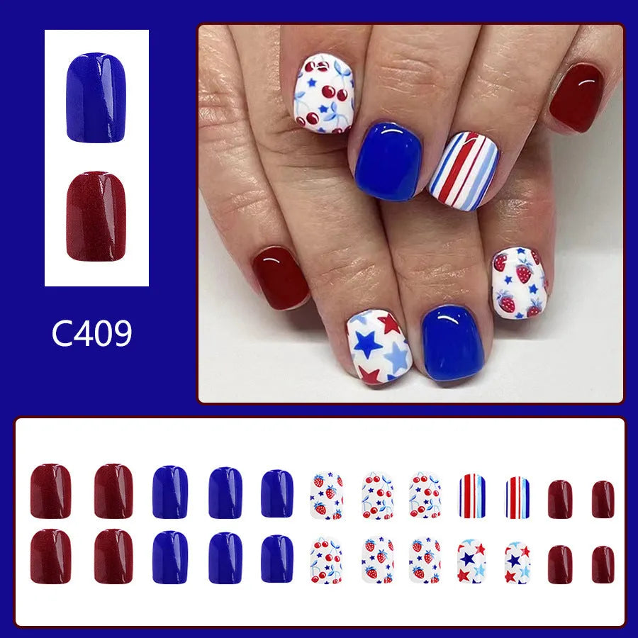 24 short glossy nail stickers with red and blue strawberry and cherry pattern