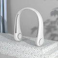 White USB charging bladeless neck fan with adjustable speed settings worn around neck