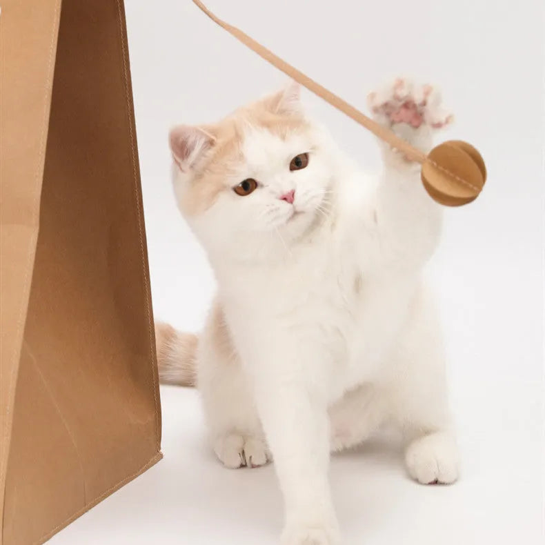 Brown paper bag cat bed with integrated scratch board, dimensions 40 by 30 by 53 cm