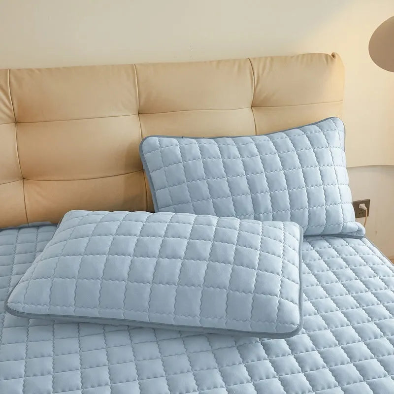 Cotton waterproof fitted sheet in blue colour with elasticated edges for mattress protection